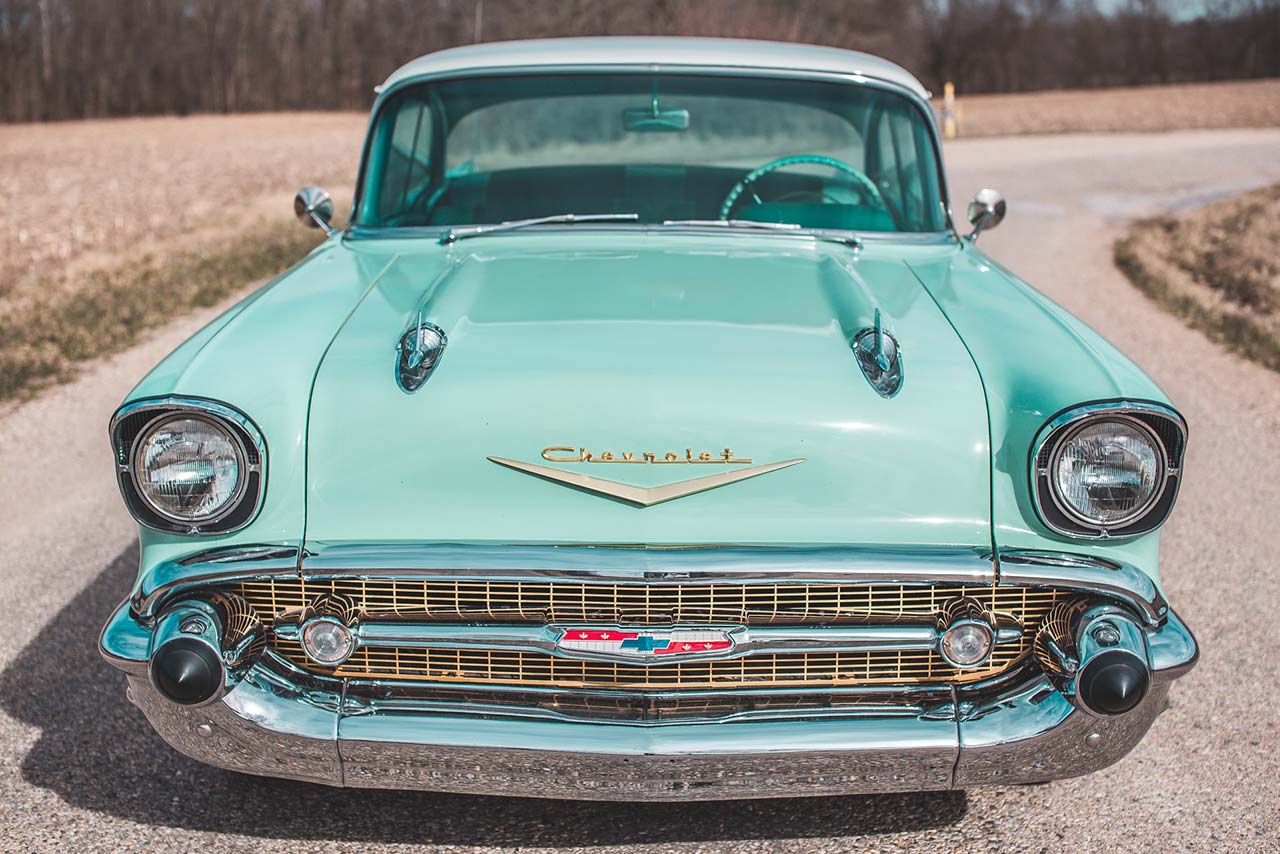 front view of a teal 1956 chevy